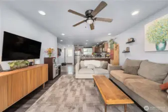 Unit 2 – Living Room: Indoor-outdoor convenience  Ceiling fan, energy-efficient windows, and step-out to the outdoor patio—ideal for entertaining, gardening, or pets.