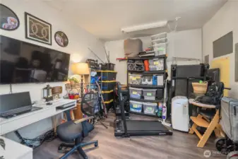 Unit 2 - Converted garage offers a valuable flex space — ideal for storage, fitness, hobbies, office use, or even a 3rd bedroom option (buyer to verify). This expanded layout increases rental versatility and long-term income potential for investors or owner-occupants.