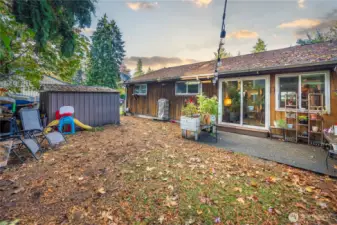 Step outside the sliding doors to a spacious patio perfect for BBQs, morning coffee, or evenings under string lights — an easy extension of your indoor living space.