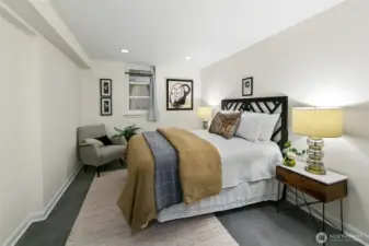 Wait for it ! Downstairs you will find heated concrete floors and a space that could easily be a primary suite, family room or guest suite.