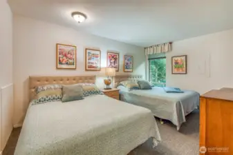 The second bedroom accommodates four guests.