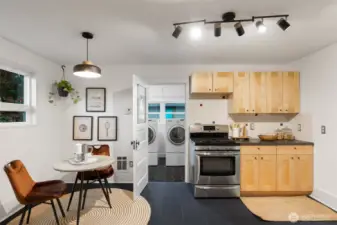 Off the kitchen is a mud room, 3/4 bath and the rear door to the back yard and garage.