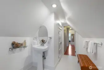 Walk-in linen closet with wrap around shelving