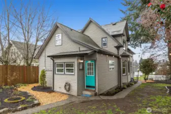 Fully fenced backyard with a dog run.