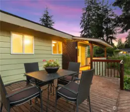 The uncovered part of the deck is very large with stairs leading to the backyard. Perfect spot for BBQ and entertaining.