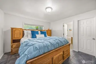 Primary bedroom with walk-in closet and 5 piece bathroom en-suite