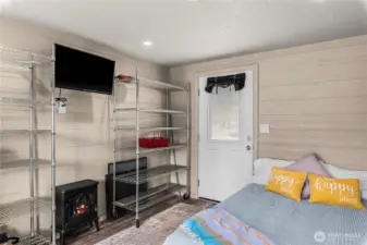 The adorable sleeping casita has power and plenty of storage. This is a queen bed.