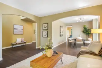 The formal living room connects seamlessly with the formal dining room.