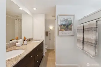 Primary ensuite with dual vanity.