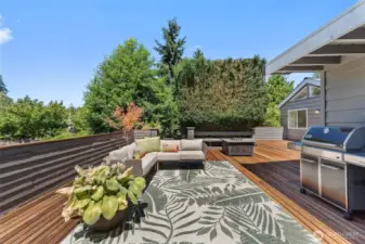 Expansive deck ready for all your backyard entertaining. BBQ stays.