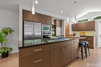 Storage space abounds with abundant drawers, cabinets, and even a huge walk-in pantry.