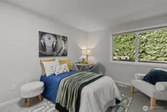 Bedroom number three is the perfect size with spacious closet with built-ins and privacy.