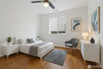 Virtually staged downstairs bedroom/office #1.