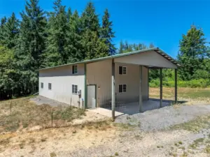 Shop with framed in  Addition-  Plumbing roughed in for Bathroom.