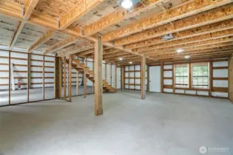 Shop with framed in  Addition-  Plumbing roughed in for Bathroom.