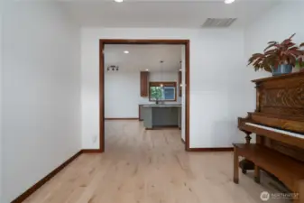 Looking toward kitchen from dining room.