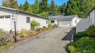 Home sits at the end of the longer driveway.