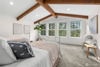 This vaulted room above the garage is currently used as a bedroom - but would make an excellent bonus room, game room, your choice!