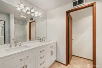 Brand new shower can be seen through the mirror