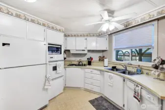 Another view of the kitchen. Great space for several individuals to be working at one time. Entertainers delight.