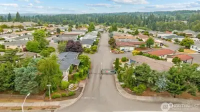 Aerial view of gated entrance into the park which shows the layout of the community.
