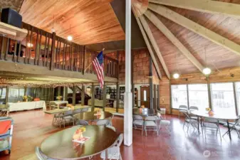 Another view of the lower level of the Clubhouse. Two kitchenettes for your convenience. Even room for dancing if you choose.