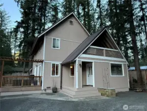Charming craftsman on just over 1/4 acre lot with mature trees adding privacy.