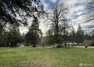 Kelly community Park w/ play area & basketball court.