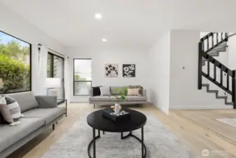 Nice and bright living room that opens to dining area