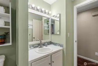 Full bathroom shared between the three bedrooms upstairs including en-suite access from the primary bedroom.