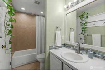 Ease into the day or spend some much needed relaxation time in this beautiful full bathroom.