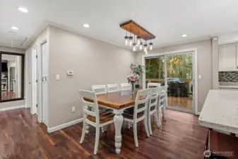 With gorgeous flooring and easy access to the outside deck, this dining space creates an refreshing, open atmosphere perfectly blended with the modern farmhouse environment.