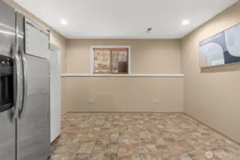 Direct access from the garage, this spacious room is perfect for a transitional mudroom, working space, or any flex space idea you can imagine!
