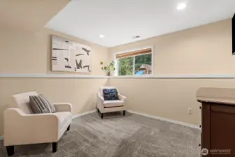 Staged as a extra bonus room, this flex space is adaptable for a home office or extra living room.