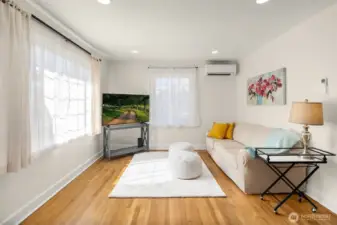 Living room with mini split heat pump.
