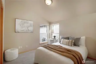 This home basically has two primary bedrooms.  This is the second bedroom upstairs also complete with an ensuite bathroom.