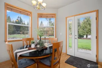 Dining nook with door to back patio.