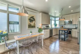 In addition to the ample cabinet space, the  banquette seating provides extra storage.