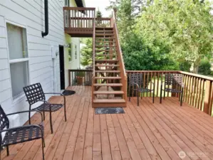 Enjoy the new (2025) downstairs rear deck off the kitchen.