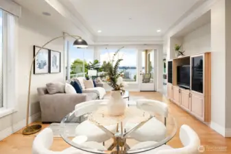 The breakfast nook and family room overlook the outdoor patio and offer lovely lake and mountain views