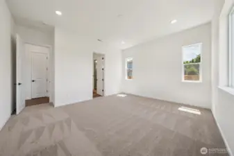 This home has a different color cabinet that is called Artic Grey stain - with a color palate of light grey flooring a grey tile. NOT ACTUAL HOME but represents the layout.