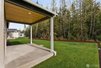 ***Actual Home***  Covered patio looking out to greenbelt