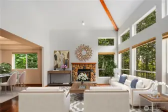 Living Room w/ Fireplace & High-Vaulted Ceilings