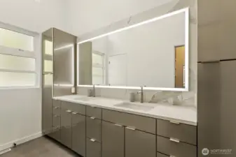 Primary bath with sleek modern designed dual vanity