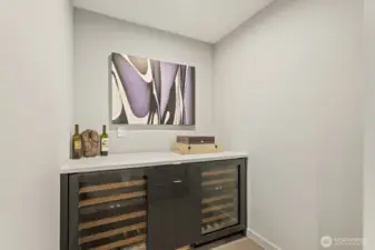 Lower level wine/beverage bar with adjacent full size temperature controlled wine cabinet (not shown here).
