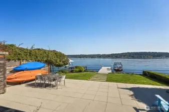 Gated waterfront with lounging area- Patio and lawn. New dock (shared with one neighbor) Private boat lift. Enjoy boating, paddleboarding and gatherings from this serene, resort style setting.