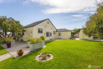 Back of the house, note raised galvanized garden beds.