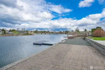 Expansive interlocking paver patio to enjoy kayaking, paddle boarding & bird watching from.