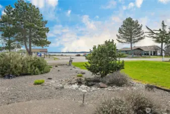 Looking from the front of the home to the Birch Bay beach directly across. This is a permanent view to enjoy the sunrises and also provides extra convenient parking if you want to host a large group in this home designed to entertain.