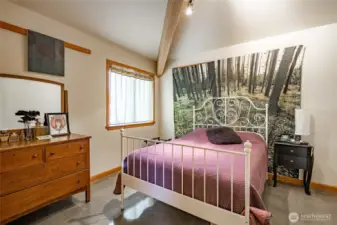 Even the bedrooms offer bright and inviting Vaulted spaces.